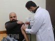 Nhân viên y tế tiêm vaccine phòng COVID-19 cho người dân tại Rafah, Dải Gaza, ngày 20/3/2022. (Ảnh: THX/TTXVN).