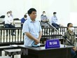 Bị cáo Nguyễn Đức Chung (cựu Chủ tịch Ủy ban Nhân dân thành phố Hà Nội) khai báo trước Tòa. (Ảnh: Phạm Kiên/TTXVN).
