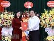 Thủ tướng Phạm Minh Chính trao Quyết định quyền Bộ trưởng Bộ Y tế cho đồng chí Đào Hồng Lan. (Ảnh: Lâm Khánh/TTXVN).