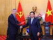 Giám đốc Học viện Chính trị quốc gia Hồ Chí Minh Nguyễn Xuân Thắng tiếp ông Marcello de Moura Extevão Filho - Giám đốc toàn cầu Ban kinh tế vĩ mô, Thương mại và Đầu tư của Ngân hàng Thế giới. (Ảnh: Văn Điệp/TTXVN)