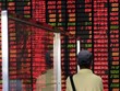 Hai chỉ số Shanghai Composite và Shenzhen Component của Trung Quốc đều ngập sắc đỏ trong phiên giao dịch 28/11. Ảnh: AFP.