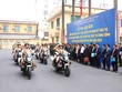 Cảnh sát giao thông cùng các lực lượng chức năng ra quân tổng kiểm tra, xử lý, giải quyết vi phạm về trật tự an toàn giao thông, trật tự đô thị, trật tự công cộng. (Ảnh: Phạm Kiên/TTXVN).