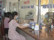 Làm thủ tục nộp thuế. (Nguồn: TTXVN).