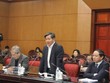 Bộ trưởng Bộ Kế hoạch và Đầu tư Bùi Quang Vinh tại phiên họp thứ 26 UBTVQH sáng 11/3 (Ảnh: Infonet)