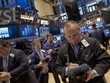 Dow Jones và S&P 500 thiết lập kỷ lục mới trong thứ Tư - Ảnh: Reuters
