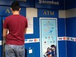 Hình ảnh nhận diện thương hiệu thẻ quốc gia NAPAS trên hệ thống ATM và trên thẻ ghi nợ nội địa