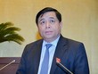 Bộ trưởng Nguyễn Chí Dũng trình bày dự án luật.