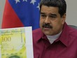 Tổng thống Venezuela giới thiệu thiết kế tờ 100.000 bolivar. Tờ tiền chỉ in số 100 nhưng dòng chữ tiếng Tây Ban Nha có ghi rõ "cien mil bolivares", có nghĩa là "một trăm nghìn bolivar".Ảnh: Reuters