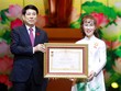 Chủ tịch nước Lương Cường trao danh hiệu Anh Hùng Lao Động cho Tiến sĩ Nguyễn Thị Phương Thảo - Chủ tịch HĐQT Vietjet Air