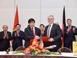 Chủ tịch nước Trương Tấn Sang và Ngoại trưởng Đức Frank - Walter Steinmeier chứng kiến lễ ký kết giữa Vietjet và Lufthansa Technik AG