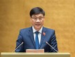 Chủ nhiệm Uỷ ban Kinh tế Vũ Hồng Thanh trình bày báo cáo tiếp thu, giải trình dự thảo Luật Các tổ chức tín dụng (sửa đổi)