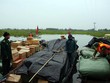Lực lượng chức năng lập biên bản, xử lý vụ việc theo quy định của pháp luật.