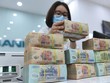 Đà tăng trưởng lợi nhuận của ngành ngân hàng dự kiến chậm lại trong 2 quý cuối năm 2021. Ảnh: Dũng Minh