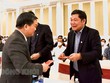 Bí thư Tỉnh ủy Bến Tre Lê Đức Thọ (bìa trái) chúc mừng Doanh nghiệp tại buổi Họp mặt đầu năm Nhâm Dần 2022 của Tỉnh