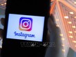  Ứng dụng Instagram được cài trên màn hình điện thoại. Ảnh: AFP/TTXVN