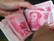 Đồng nhân dân tệ giao ngay mở cửa phiên giao dịch 13/2 ở mức 6,8349 CNY đổi 1 USD. Ảnh: AFP