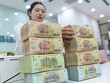 Tín dụng khó chảy mạnh do áp lực lãi vay cao 