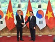 Phó thủ tướng Chính phủ Lê Minh Khái và Phó thủ tướng Hàn Quốc Kyungho Choo. (Ảnh: VGP/Quang Thương)
