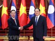 Chủ tịch nước Võ Văn Thưởng hội kiến Thủ tướng Lào Sonexay Siphandone. (Ảnh: Thống Nhất/TTXVN)