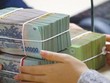 Người dân mạnh tay gửi tiền vào ngân hàng, huy động vẫn tăng chậm hơn tín dụng