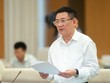 Bộ trưởng Hồ Đức Phớc trình bày Tờ trình dự thảo Nghị quyết của Quốc hội về việc áp dụng thuế thu nhập doanh nghiệp bổ sung theo quy định chống xói mòn cơ sở thuế toàn cầu