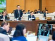 Bộ trưởng Bộ Xây dựng Nguyễn Thanh Nghị phát biểu tại phiên họp.