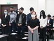 Cựu Chủ tịch Tập đoàn Vimedimex Nguyễn Thị Loan (đứng phía trước) và nhóm đồng phạm hầu tòa.