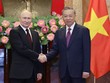 Chủ tịch nước Tô Lâm và Tổng thống Putin chụp ảnh trước Hội đàm. (Ảnh: Đức Thanh)