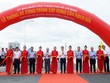 Lãnh đạo TP.HCM cắt băng thông xe cầu Rạch Đỉa. Ảnh: Lê Vinh