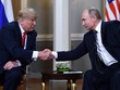 Tổng thống Mỹ Donald Trump và người đồng cấp Liên bang Nga Vladimir Putin tại cuộc gặp ở Phần Lan. Ảnh: AFP/TTXVN