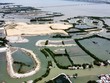 Bình Định sắp triển khai đề tài đánh giá chất lượng, trữ lượng, các khu vực có tiềm năng khai thác cát nhiễm mặn trong đầm Thị Nại để phục vụ san nền công trình. Ảnh: T.D.