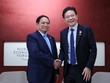 Thủ tướng Phạm Minh Chính và Thủ tướng Singapore Lawrence Wong. Ảnh: Nhật Bắc. 