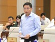 Bộ trưởng Bộ Tài chính Nguyễn Văn Thắng báo cáo tại phiên họp.