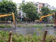 Thi công dự án cải tạo môi trường, xây dựng hạ tầng rạch Xuyên Tâm. Ảnh: Lê Minh