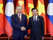 Tổng Bí thư Tô Lâm và Tổng Bí thư, Chủ tịch nước Lào Thongloun Sisoulith đồng chủ trì Cuộc gặp cấp cao giữa Đảng Cộng sản Việt Nam và Đảng Nhân dân Cách mạng Lào - Ảnh: Thống Nhất/TTXVN.