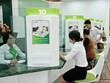 Giảm lãi suất để hỗ trợ DN, Vietcombank sẽ điều chỉnh kế hoạch lợi nhuận năm 2014 - Ảnh: Hoài Nam