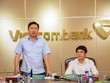 Bí thư Thành ủy Tp.HCM Đinh La Thăng và  ông Nghiêm Xuân Thành, Chủ tịch HĐQT Vietcombank tại buổi gặp