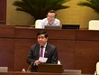 Bộ trưởng Bộ Kế hoạch và đầu tư Nguyễn Chí Dũng giải trình ý kiến đại biểu - Ảnh QK.