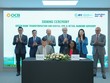 Đại diện OCB và IFC thực hiện ký kết thỏa thuận tư vấn chuyển đổi ngân hàng xanh và dịch vụ ngân hàng số