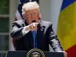 Tổng thống Mỹ Donald Trump trong họp báo chung với người đồng cấp Romania. Ảnh: Reuters