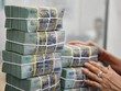 Huy động vốn chậm hơn cho vay đang tạo áp lực lên thanh khoản của hệ thống ngân hàng.