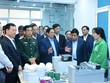 Thủ tướng Chính phủ Phạm Minh Chính và đoàn công tác tới thăm và làm việc tại Trung tâm Đổi mới sáng tạo quốc gia (NIC). Ảnh: Dũng Minh