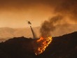 Máy bay trực thăng thả nước dập tắt các đám cháy tại Santa Clarita. Ảnh AFP.