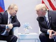 Putin (trái) và Trump gặp nhau tại G20 ở Đức năm 2017. Ảnh: Reuters.
