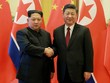 Lãnh đạo Triều Tiên Kim Jong-un (trái) đến Bắc Kinh gặp Chủ tịch Trung Quốc Tập Cận Bình hồi tháng ba. Ảnh: Xinhua.