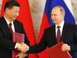 Putin và Tập Cận Bình bắt tay trong một lễ ký kết sau đàm phán hồi tháng 7/2017 tại Điện Kremlin. Ảnh: Reuters.
