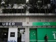 Grab và Uber bị Singapore phạt 9,5 triệu USD vì thương vụ sáp nhập.