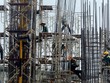 Công nhân làm việc trong một dự án xây dựng tại Hà Nội. Ảnh: Reuters.