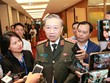 Bộ trưởng Bộ Công an Tô Lâm trả lời phỏng vấn báo chí bên hành lang Quốc hội. (Ảnh: Doãn Tấn/TTXVN).