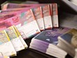 Một số mệnh giá của tiền franc Thụy Sỹ. Ảnh: Bloomberg.